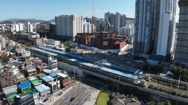 Bustling city with a train station