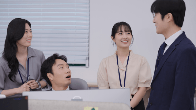 Office workers discussing a project