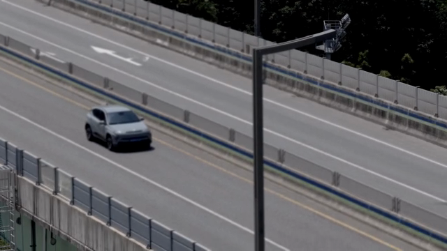 Cars driving on a highway bridge