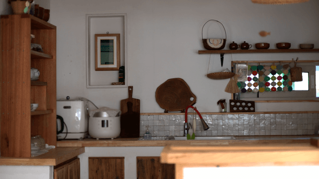 Cozy kitchen with wooden shelves