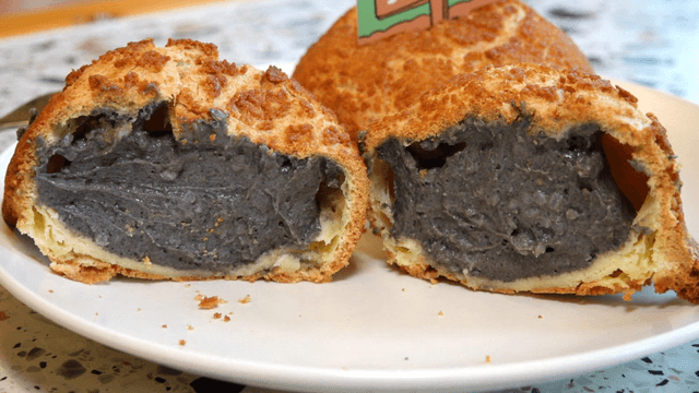 Cream-filled pastry on a plate