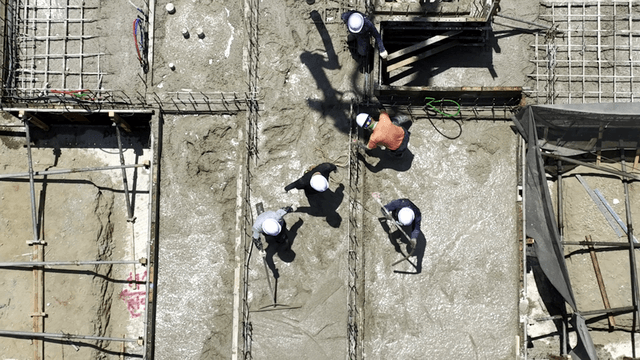 Construction workers at a building site