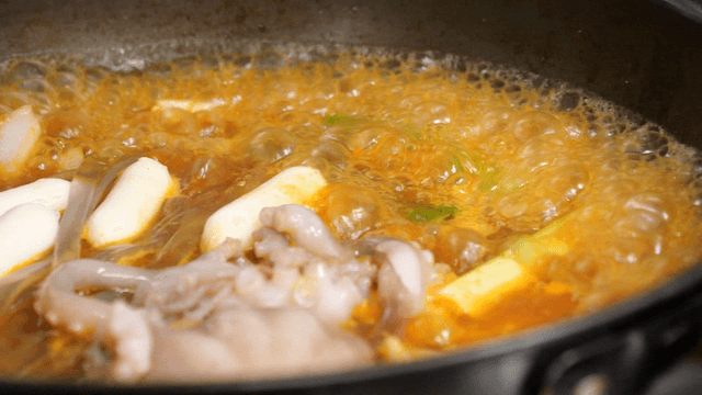 Seafood braised chicken with rice cake and octopus