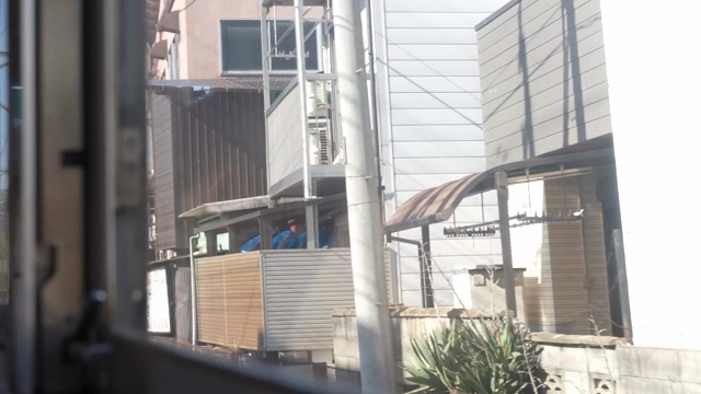 View of Japanese residential buildings from a train