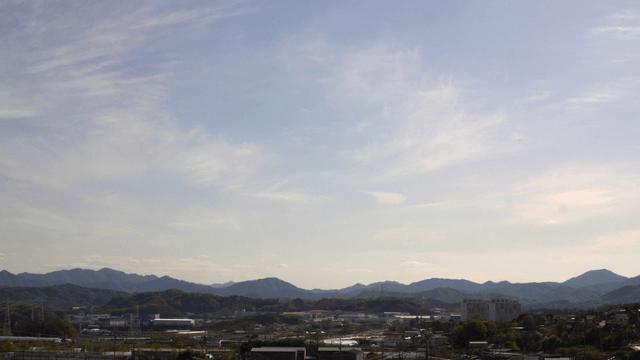 Peaceful town with distant mountains