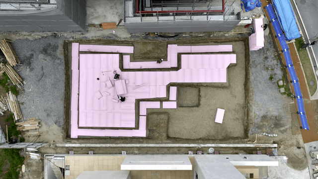 Construction site with pink insulation boards