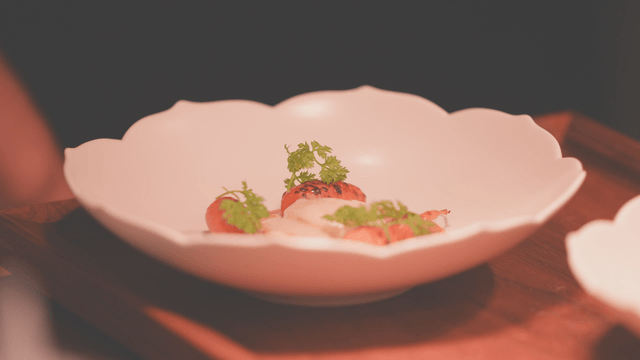 Fine cuisine garnished with toppings