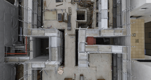 Construction site with scaffolding and workers