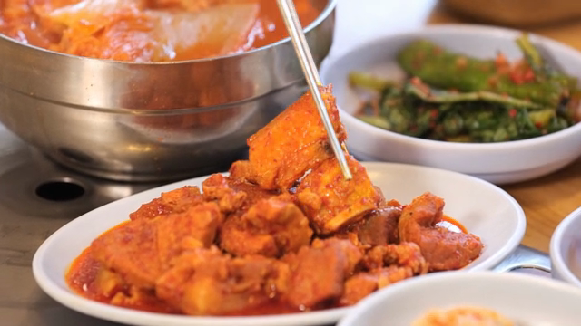 Spicy stir-fried pork on a table