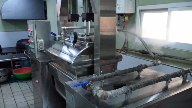 Industrial kitchen with steaming equipment