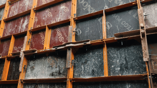 Rusty construction framework with metal beams