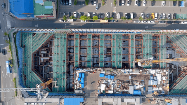 Workers discussing on a construction site