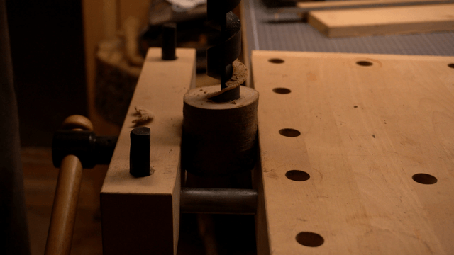 Drilling wood in a workshop