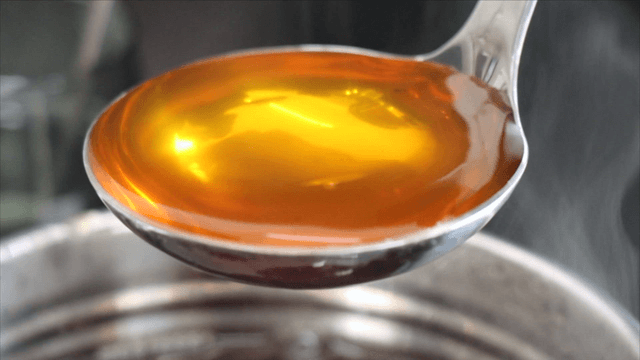 Ladle full of herbal broth