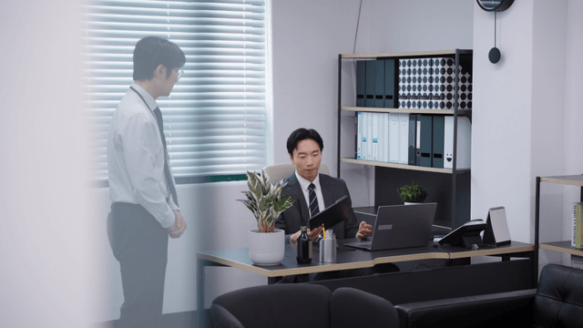 Office meeting with two colleagues