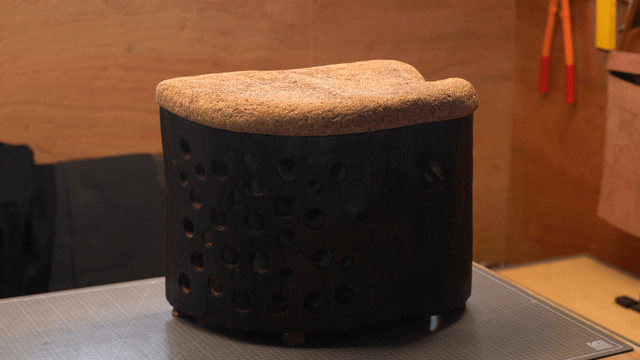 Wooden chair with cork seat in a woodworking studio