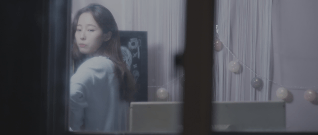 Man peeking at a woman