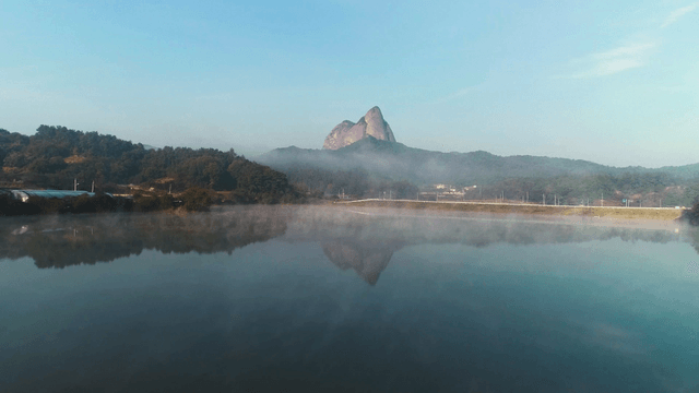 Serene lake with a mountain view