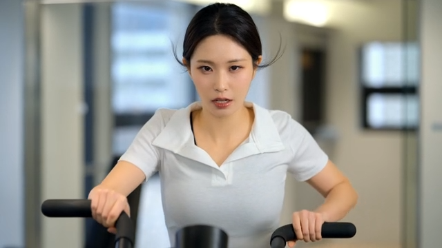 Woman exercising on a stationary bike