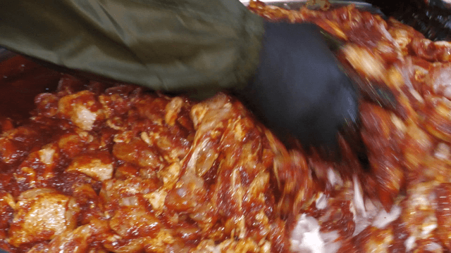Seasoned stir-fried chicken mixed in a bowl