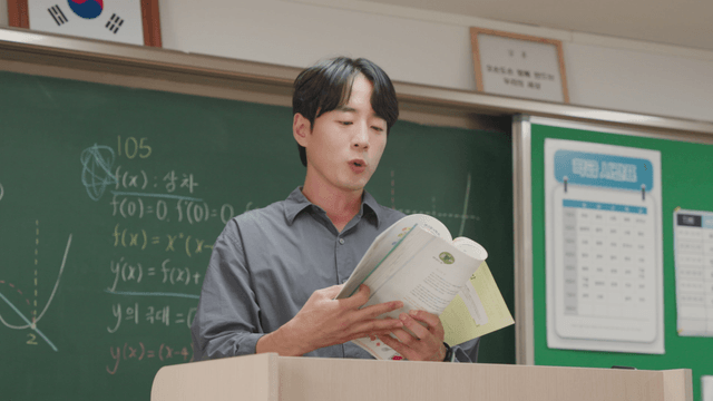 Teacher giving a lecture in a classroom
