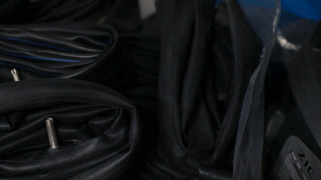 Stack of black rubber tubes