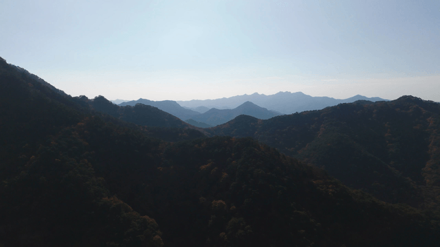 Mountain range under clear blue sky