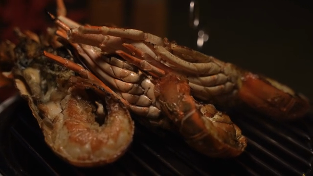 Grilled lobster on a barbecue grill