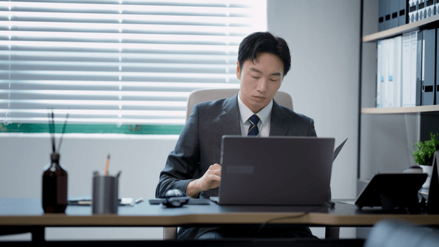 Man working at a desk in an office