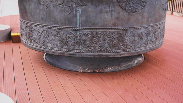 Large bronze bell with intricate design