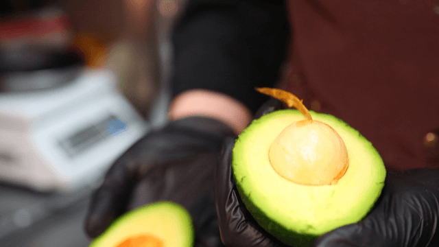 Chef preparing avocado