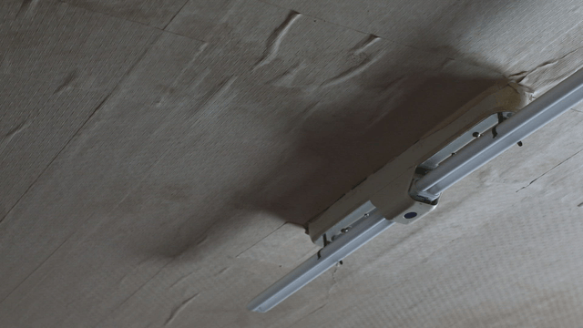 Ceiling with a fluorescent light fixture