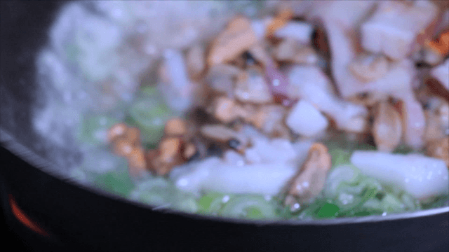 Seafood cooking on hot pan