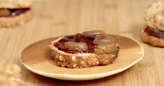 Bread with strawberry jam and chestnuts