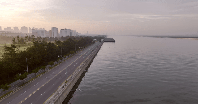 Quiet coastal road at dawn