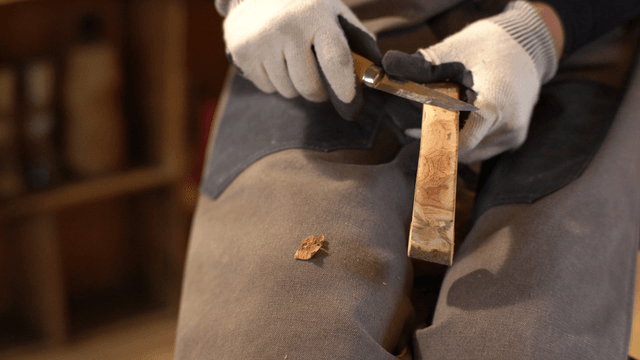 Woodcraft artisan carving wood precisely