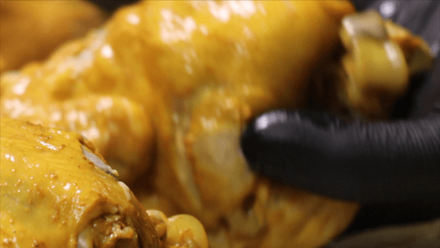 Boiled chickens and phellinus linteus stacking on a tray