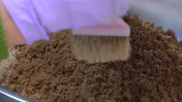 Mixing ingredients in a metal bowl