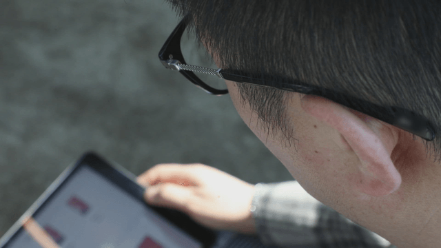 Person looking at a tablet