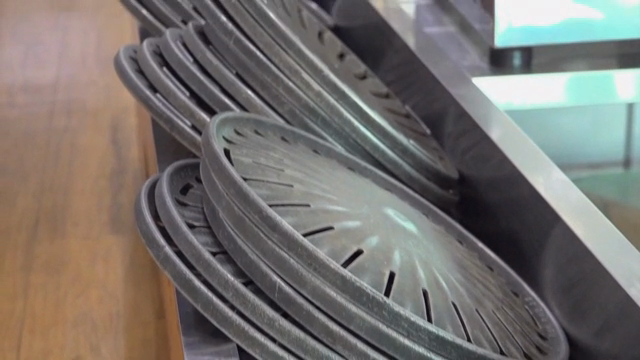 Korean barbecue grill plates stacked