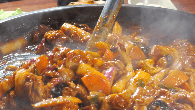 Spicy stir-fried chicken cooked with various vegetables