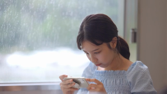 Woman taking pictures of food with smartphone