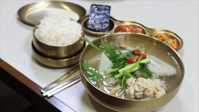 Cod soup served with rice and side dishes