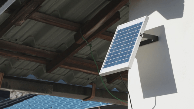Solar panel mounted on a building wall
