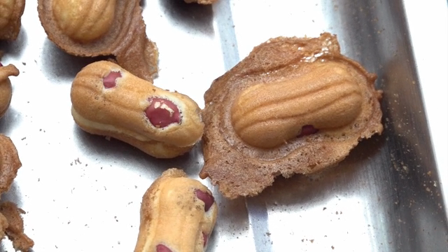Freshly baked peanut-shaped bread