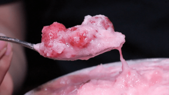 A spoonful of strawberry shaved ice