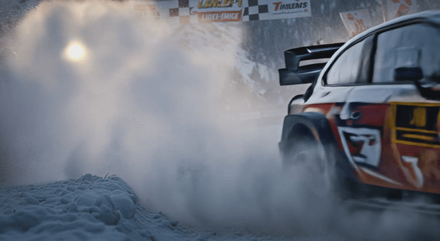 Car racing on a snow-covered track with cheering people