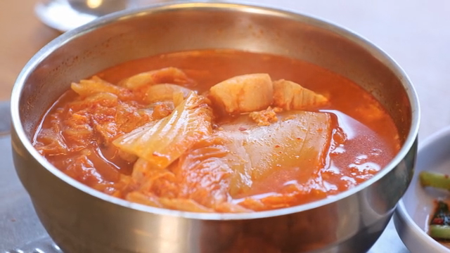 Kimchi jjigae in a metal bowl