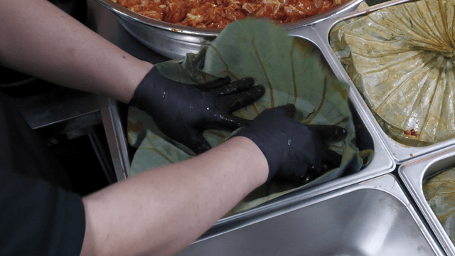 Seasoned stir-fried chicken wrapped in a lotus leaf
