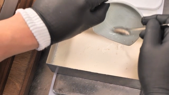 A person making tofu